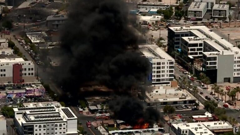 Multiple buildings set ablaze in 2-alarm Las Vegas fire