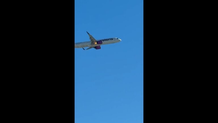 Flames shoot from jet engine on plane departing Las Vegas
